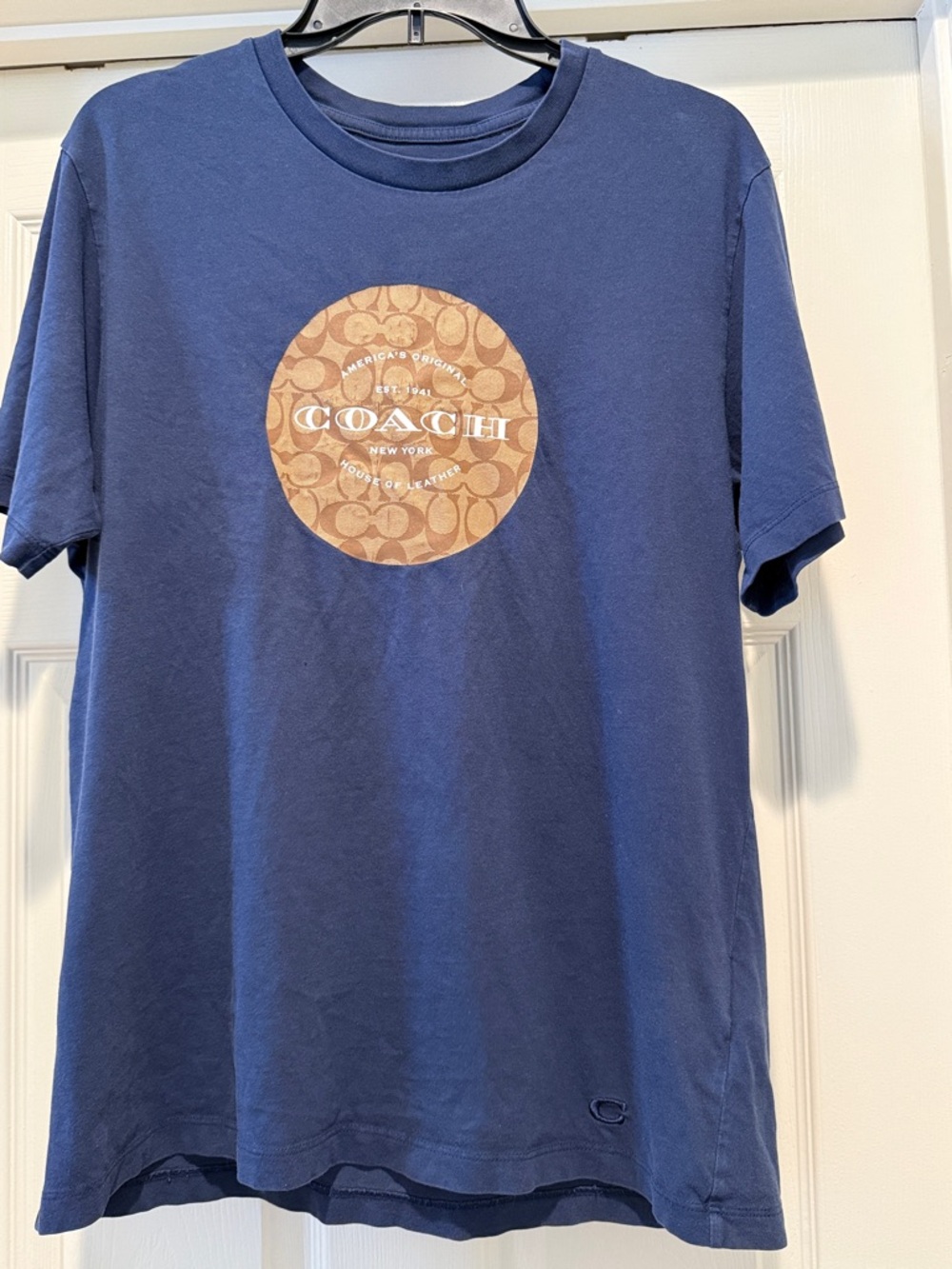 Coach Navy Blue Short Sleeve Tee with Brown Logo Circle. Large but fits like a M